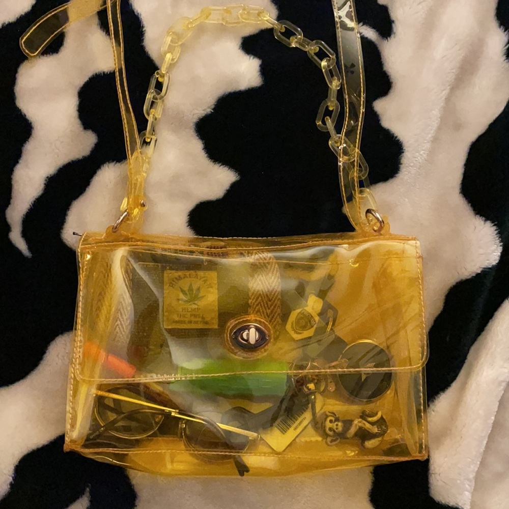 See through yellow purse